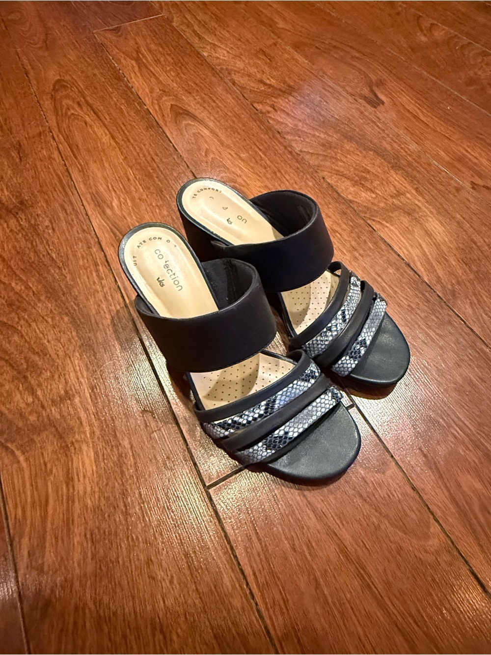 Clarks Black Slide Sandals with Snake-Print Straps